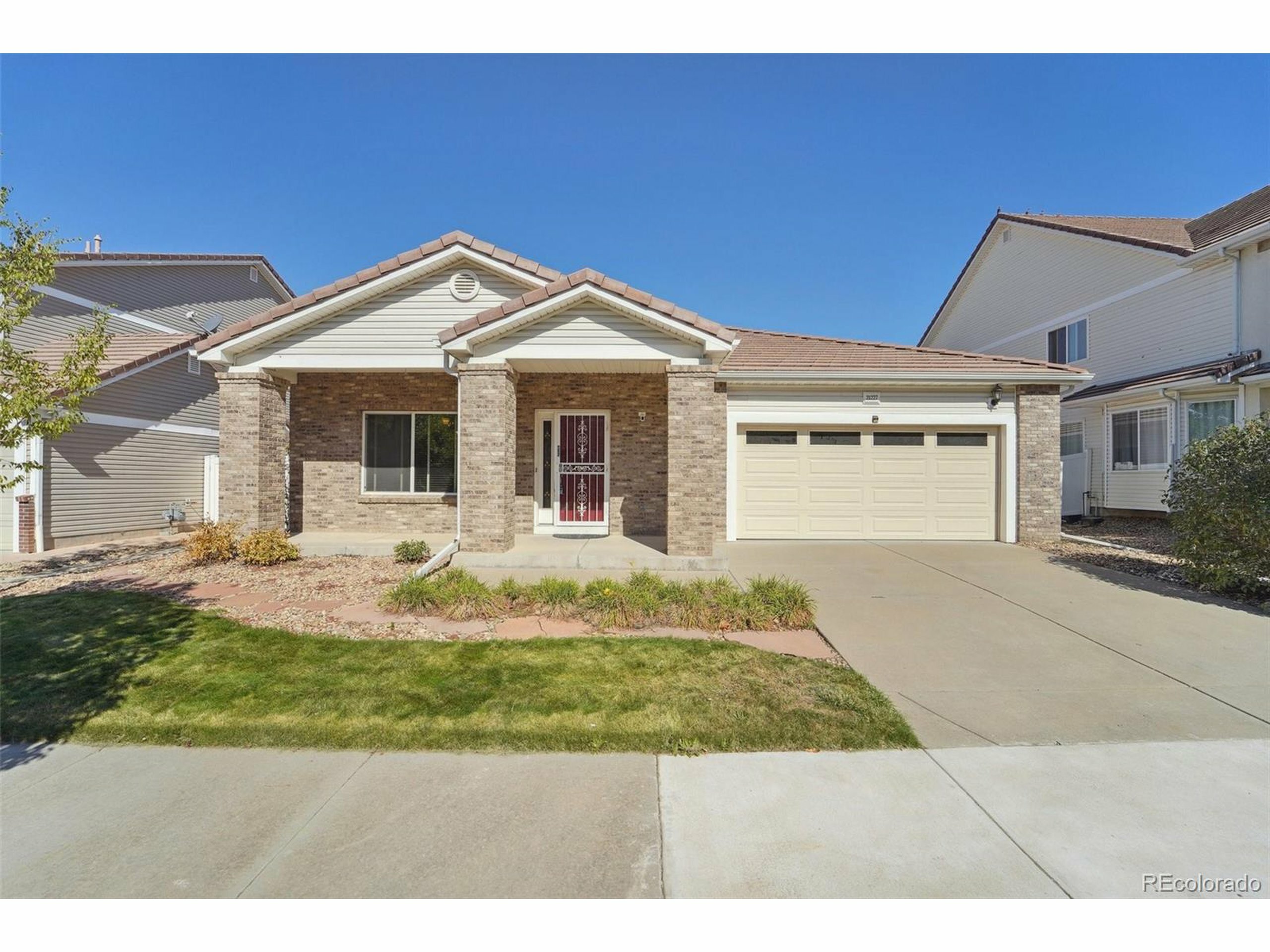 Property Photo: 21227 E 49th Pl CO 80249
