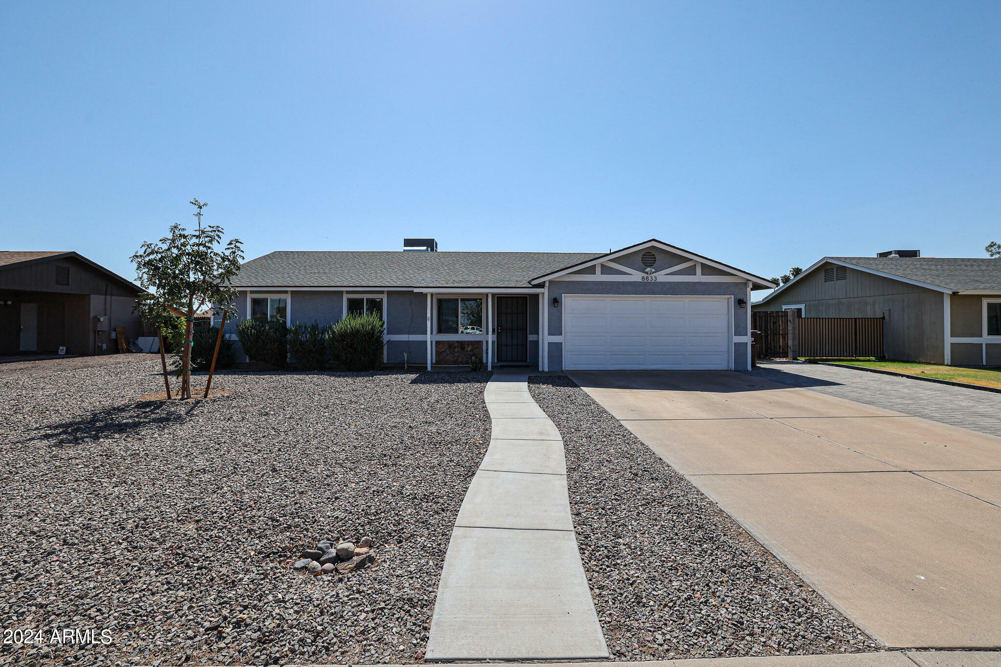 Property Photo:  8833 W Monroe Street  AZ 85345 