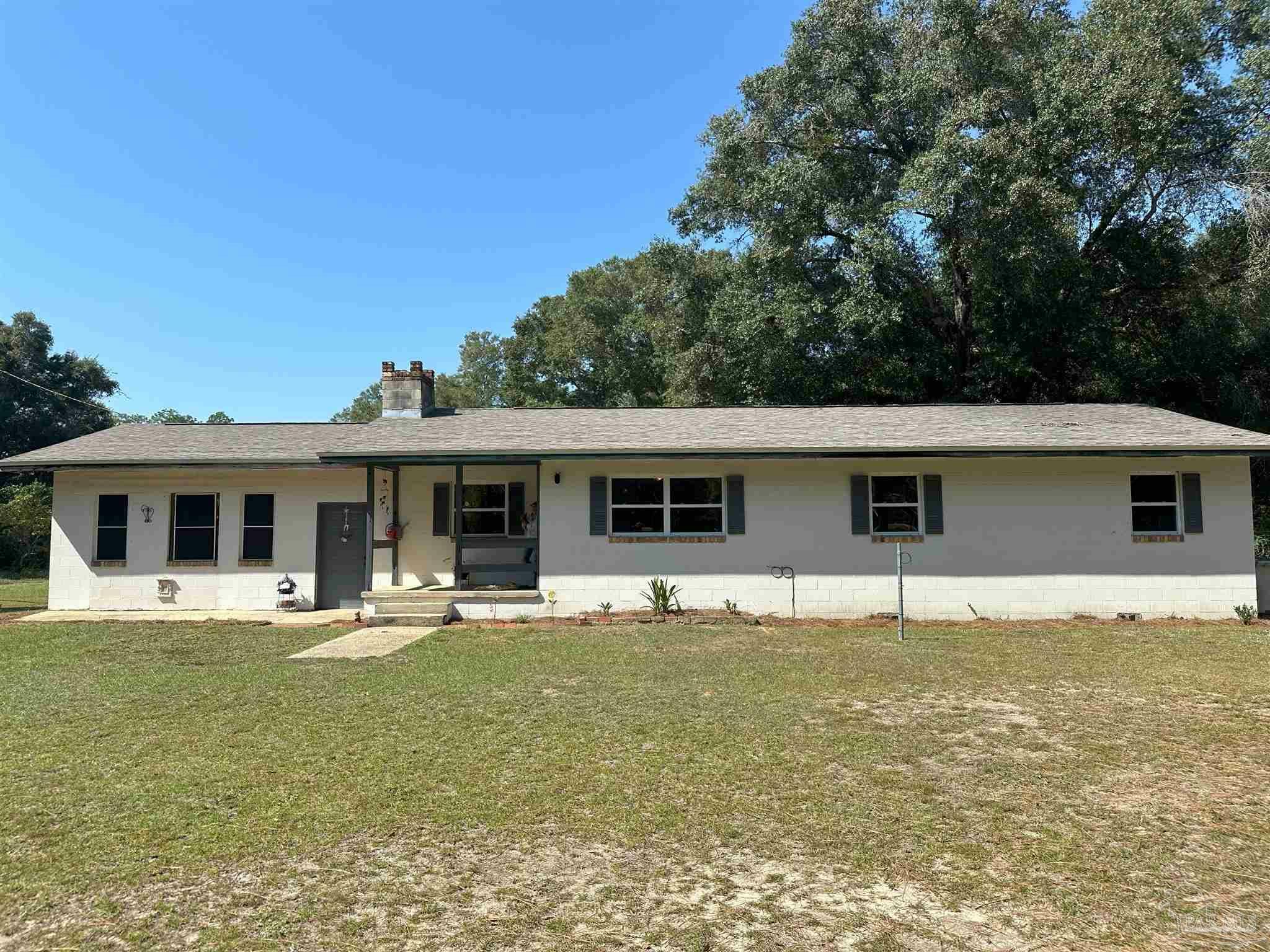 Property Photo:  9421 Chumuckla Hwy  FL 32565 