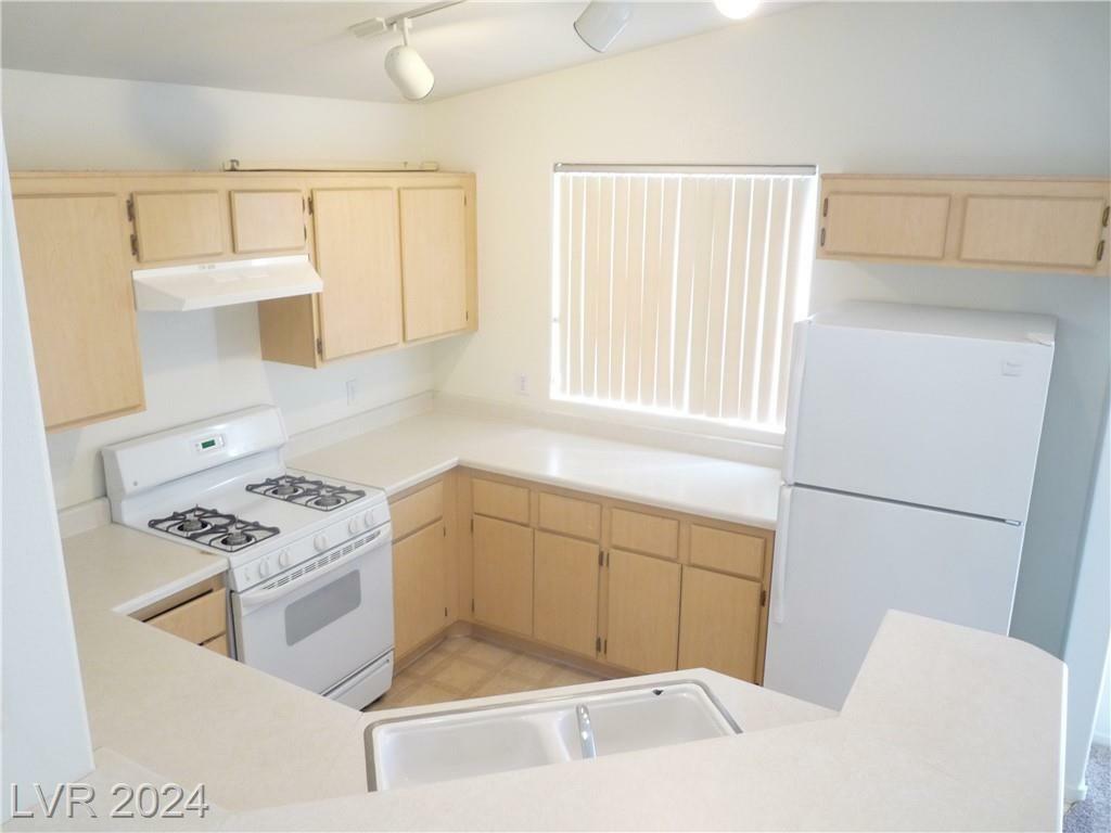 Property Photo:  1881 West Alexander Road 2105  NV 89032 