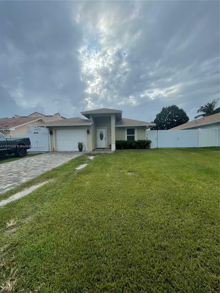 Property Photo:  1369 Rainbow Ave  FL 33406 