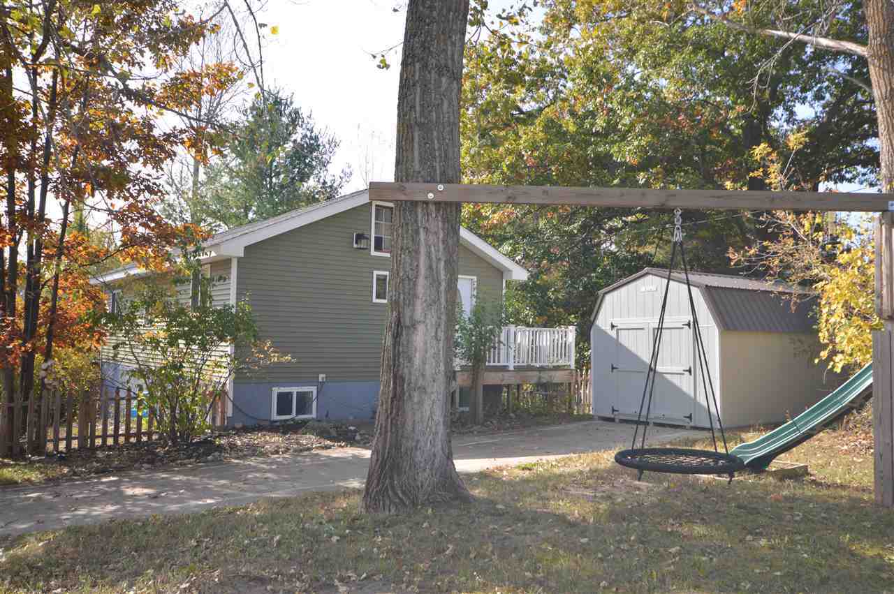 Property Photo:  211 Jefferson  MI 49712 