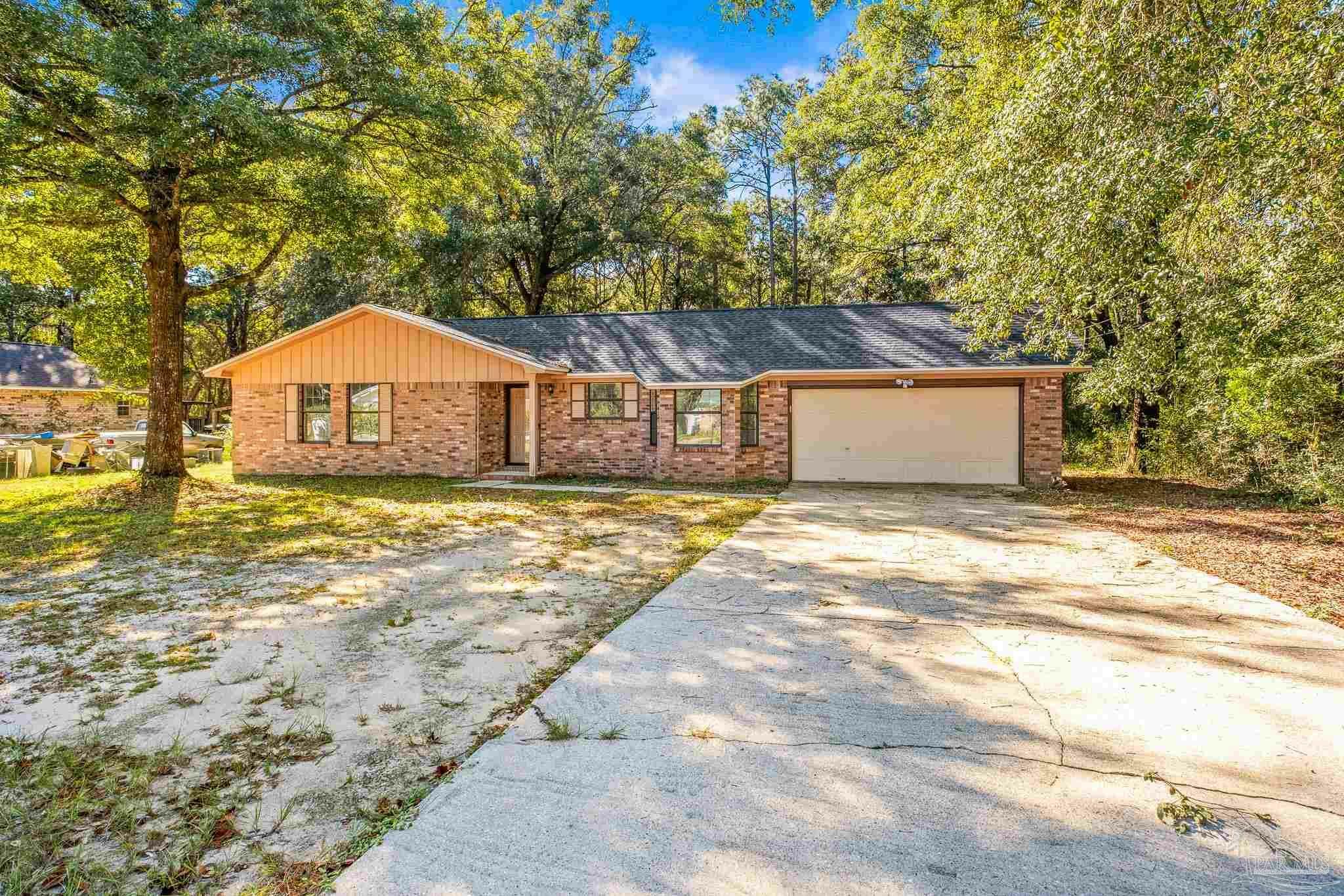 Property Photo:  6565 Bass Ln  FL 32570 