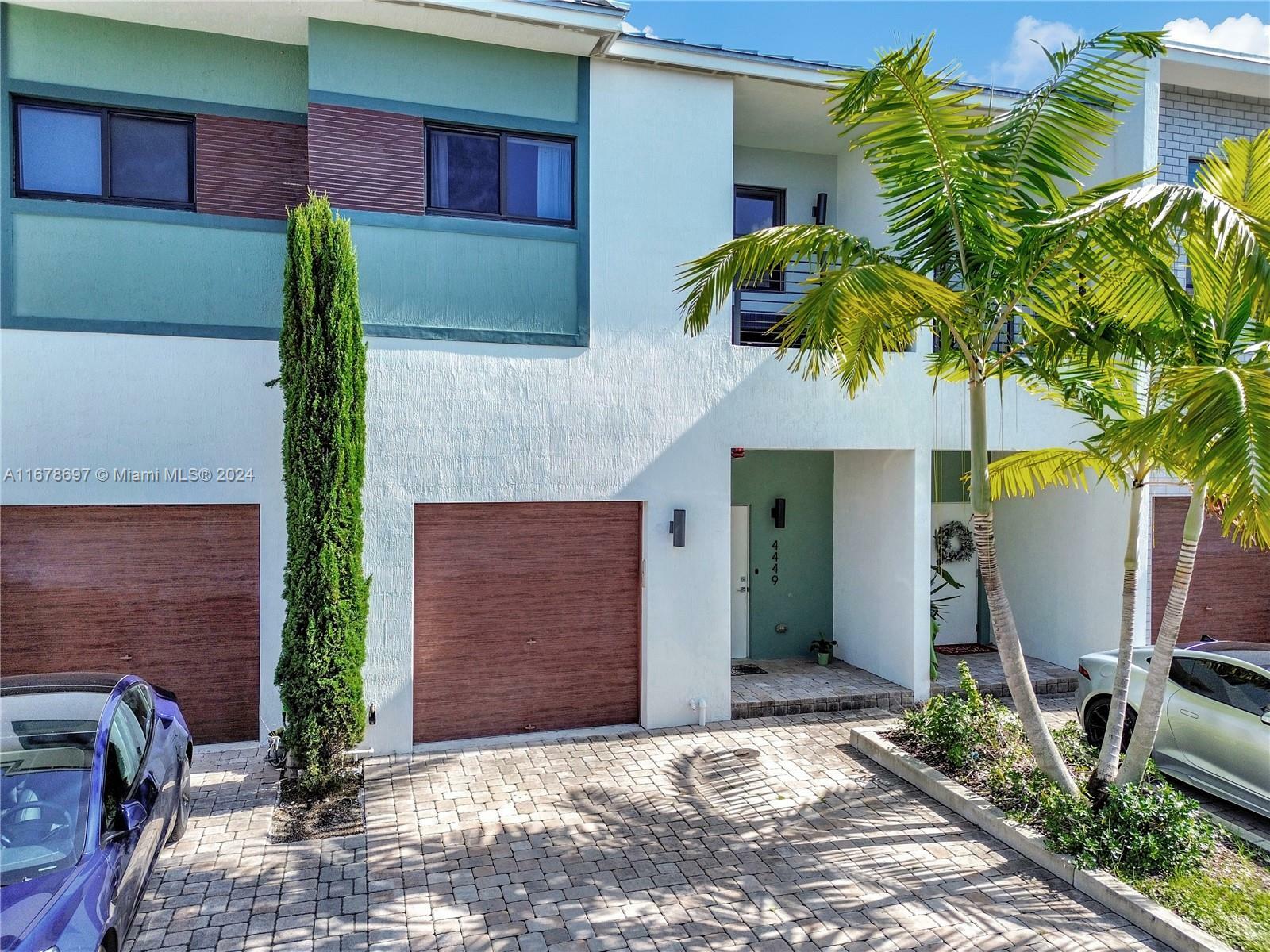 Property Photo:  4449 NW 9th St 4449  FL 33317 