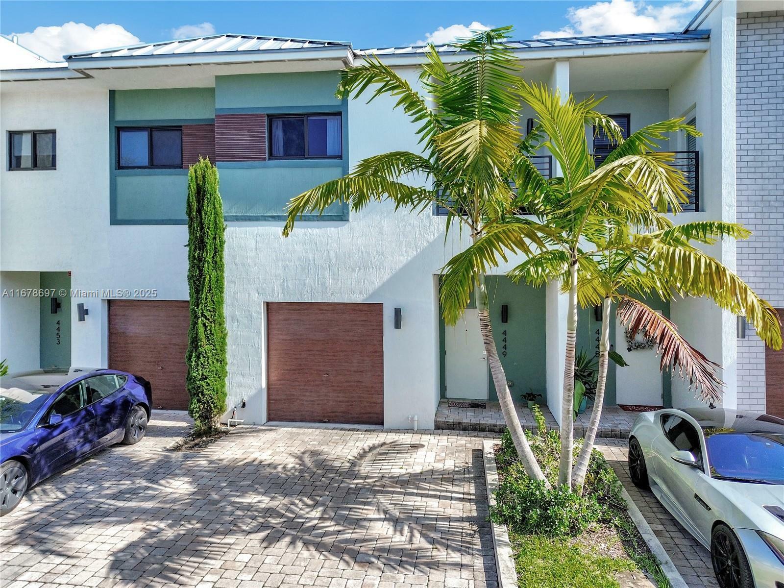 Property Photo:  4449 NW 9th St 4449  FL 33317 