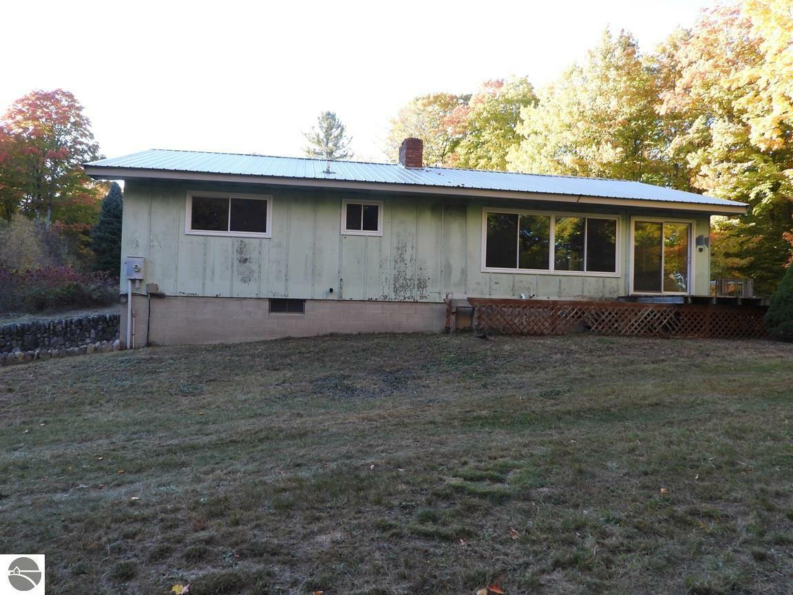 Property Photo:  10562 SE Donathan Road  MI 49633 