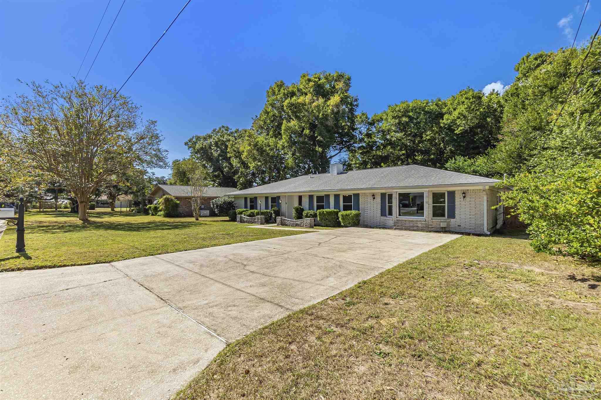 Property Photo:  205 N 59th Ave  FL 32506 