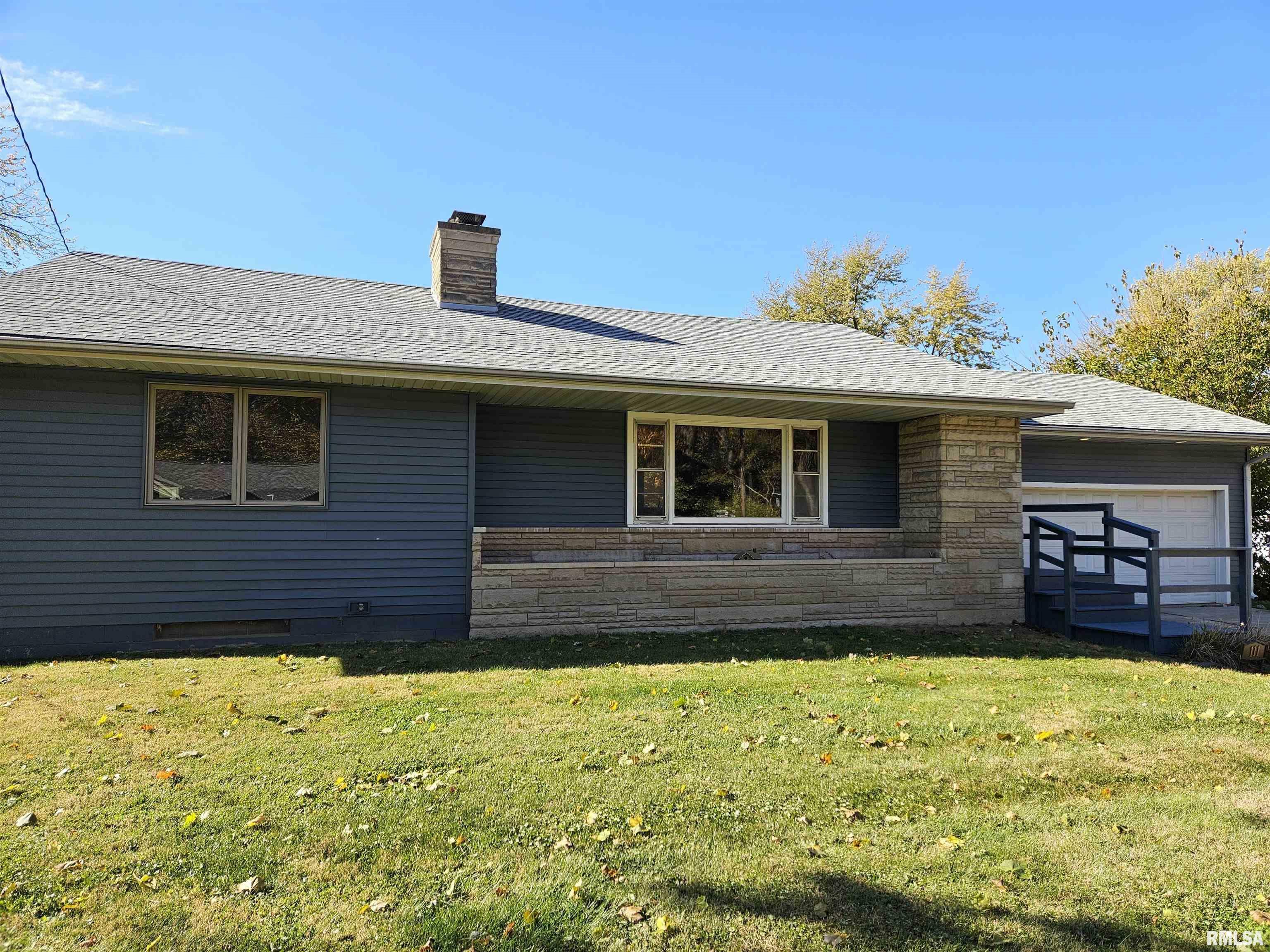 Property Photo:  111 N Sanderson Avenue  IL 61607 