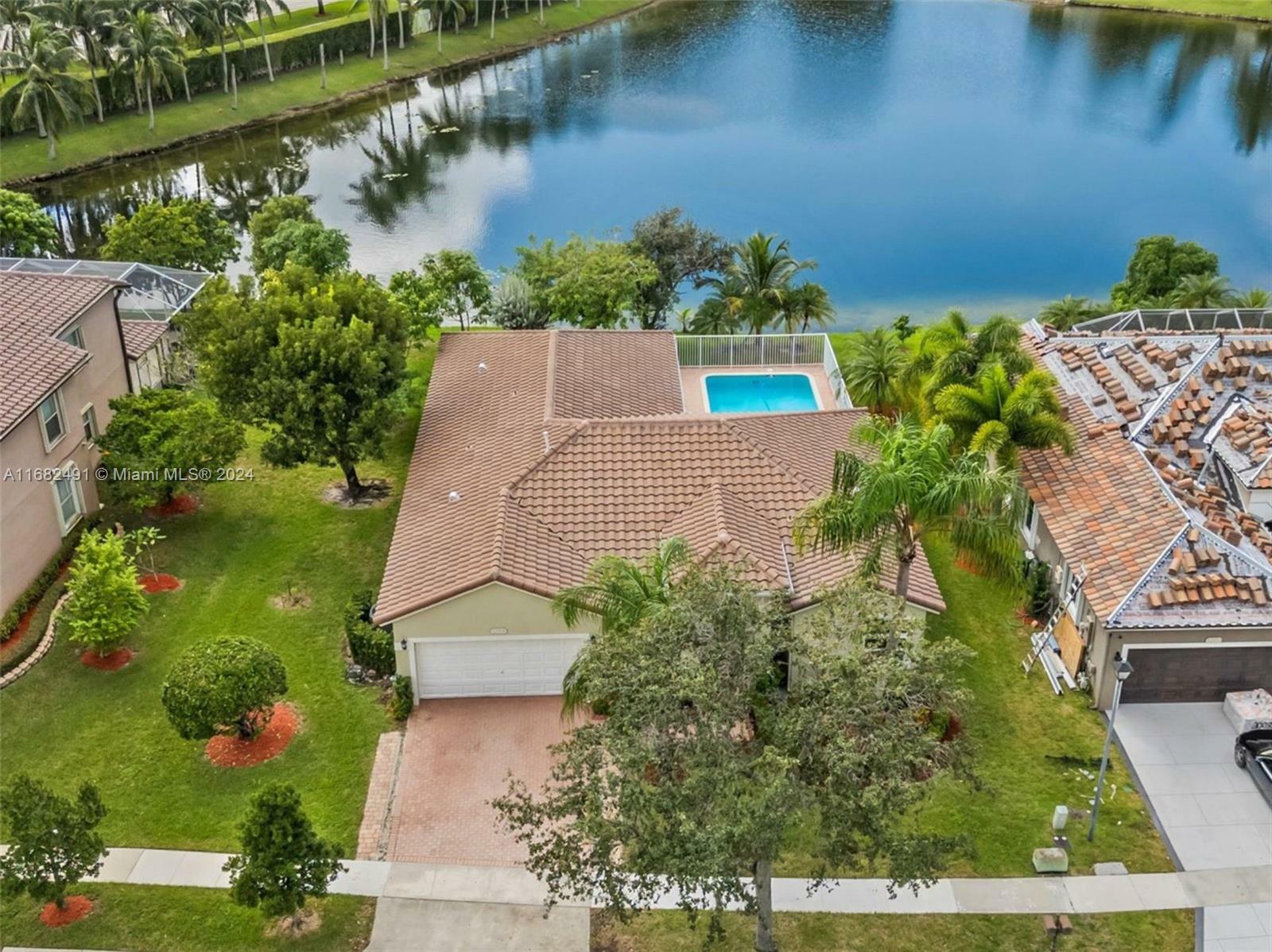 Property Photo:  12968 NW 18th Ct  FL 33028 