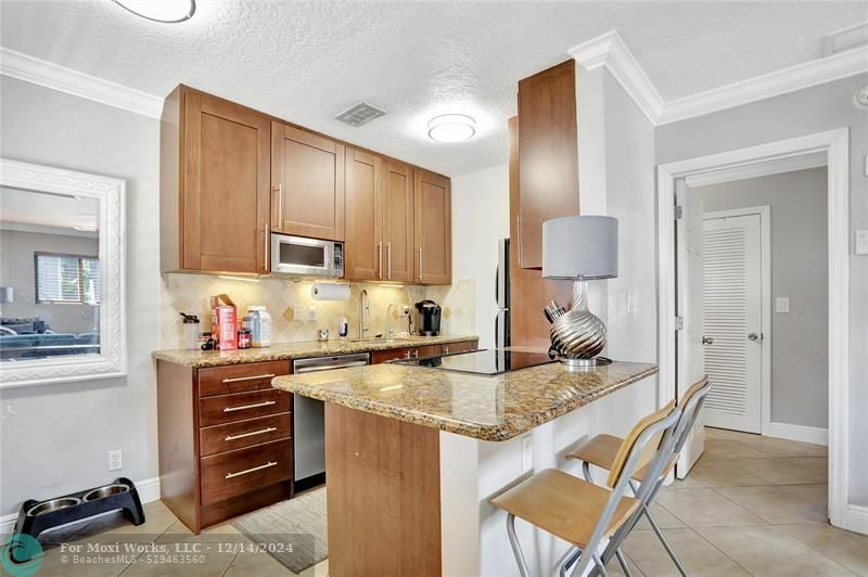 Property Photo:  1311 NE 18th St 207  FL 33305 