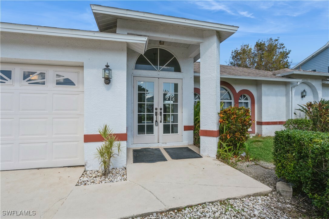 Property Photo:  8457 Grove Road  FL 33967 