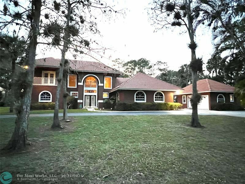 Property Photo:  827 Squire Dr  FL 33414 