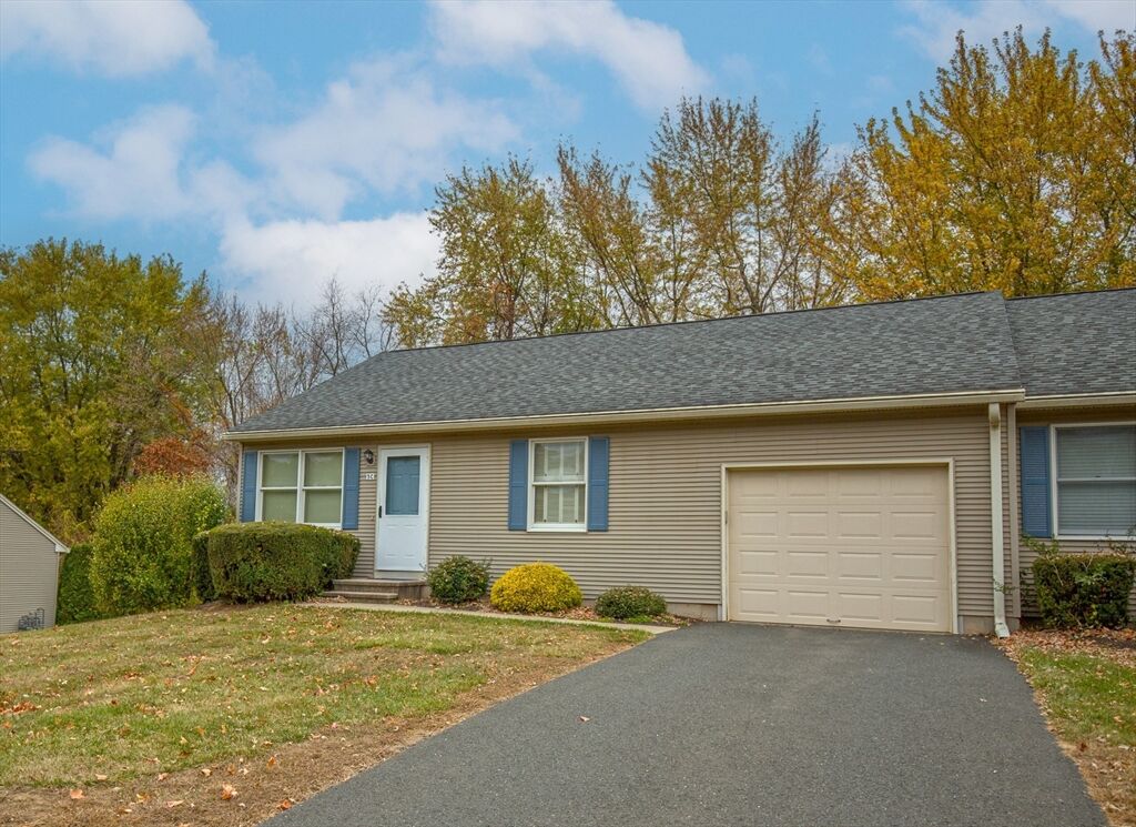 Property Photo:  102 North Maple St 5C  CT 06082 