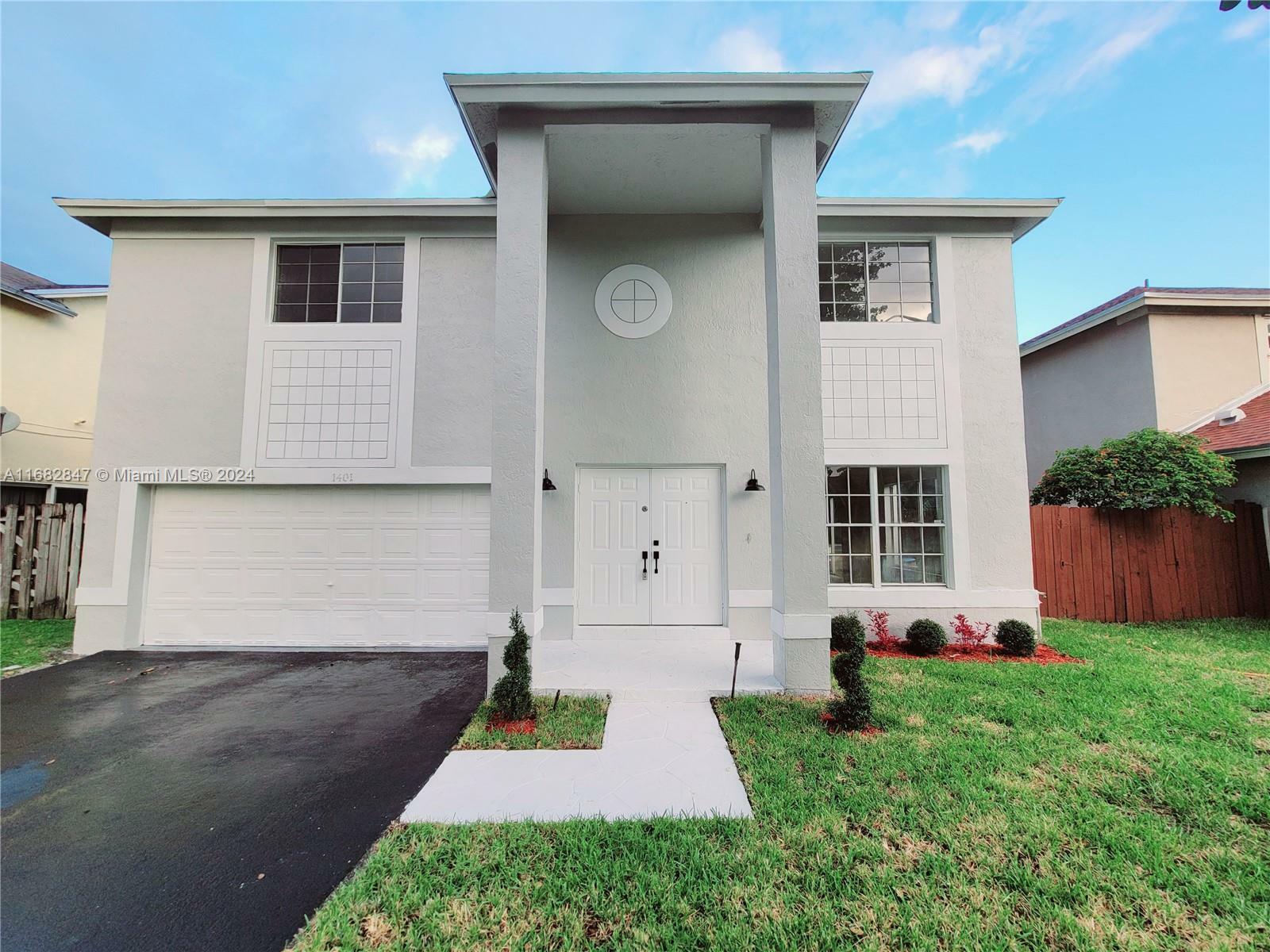 Property Photo:  1401 SW 97th Ave  FL 33025 