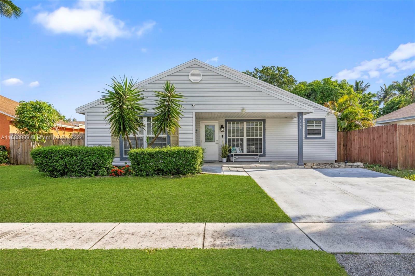 Property Photo:  8660 SW 16th St  FL 33025 