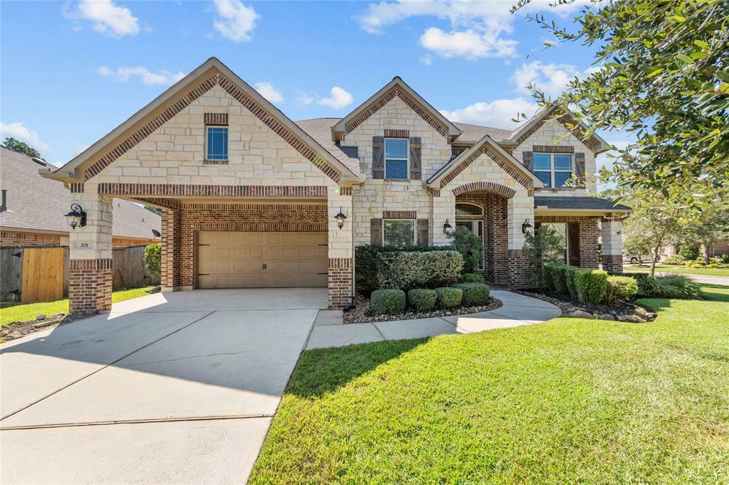 Property Photo:  201 River Wilde Drive  TX 77316 