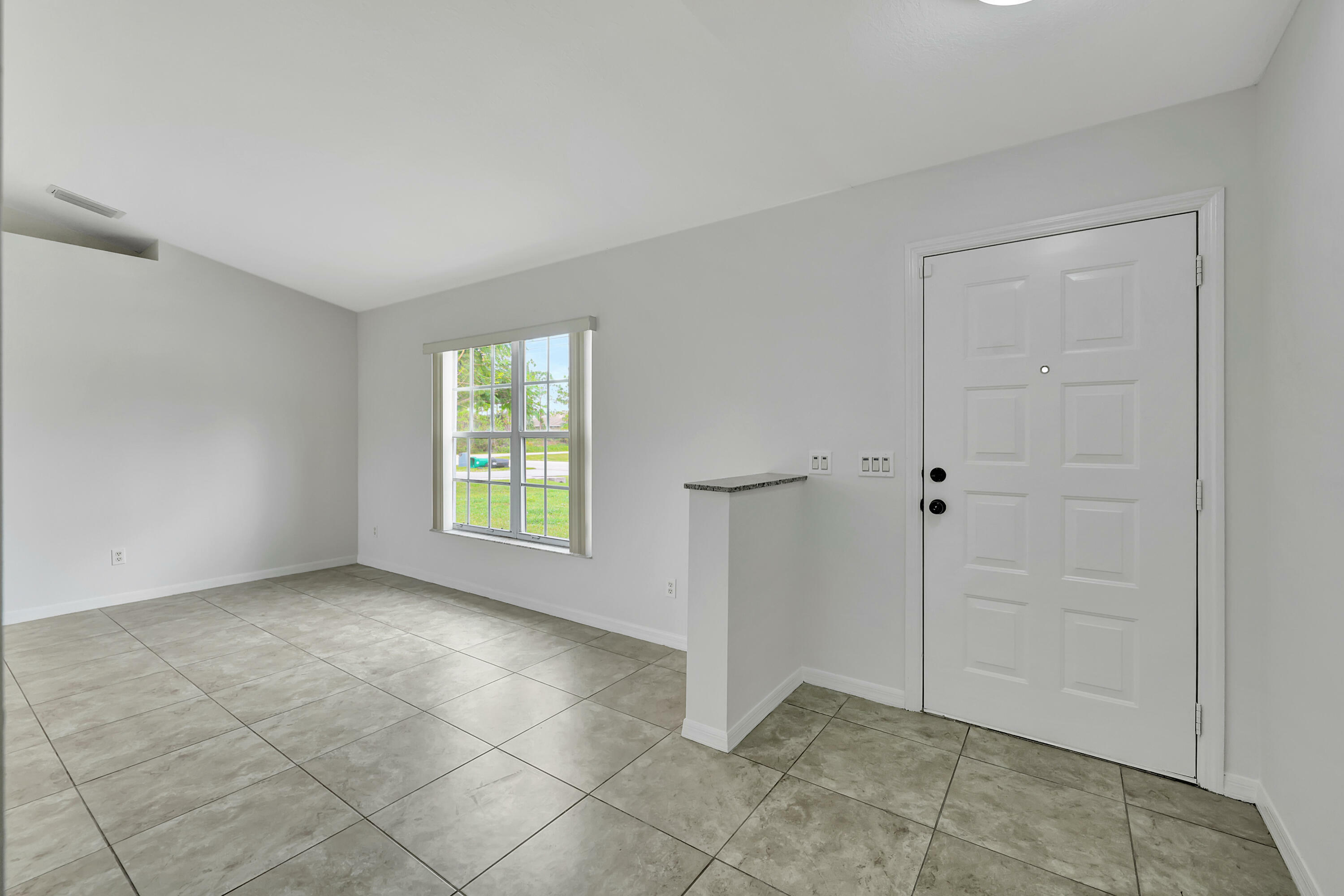 Property Photo:  6480 NW Volucia Drive  FL 34986 