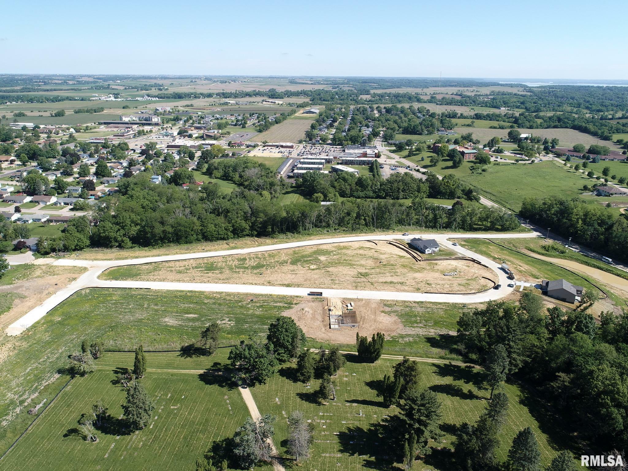 Property Photo:  907 Riverstone Road  IA 52732 