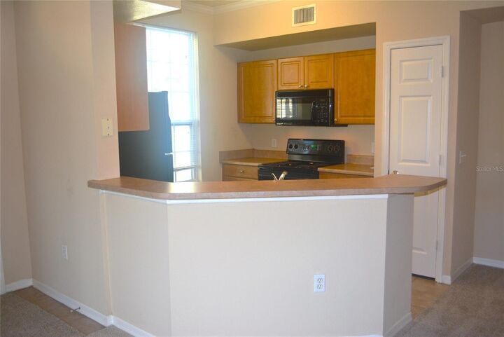 Property Photo:  5701 Soldier Circle 104  FL 34233 