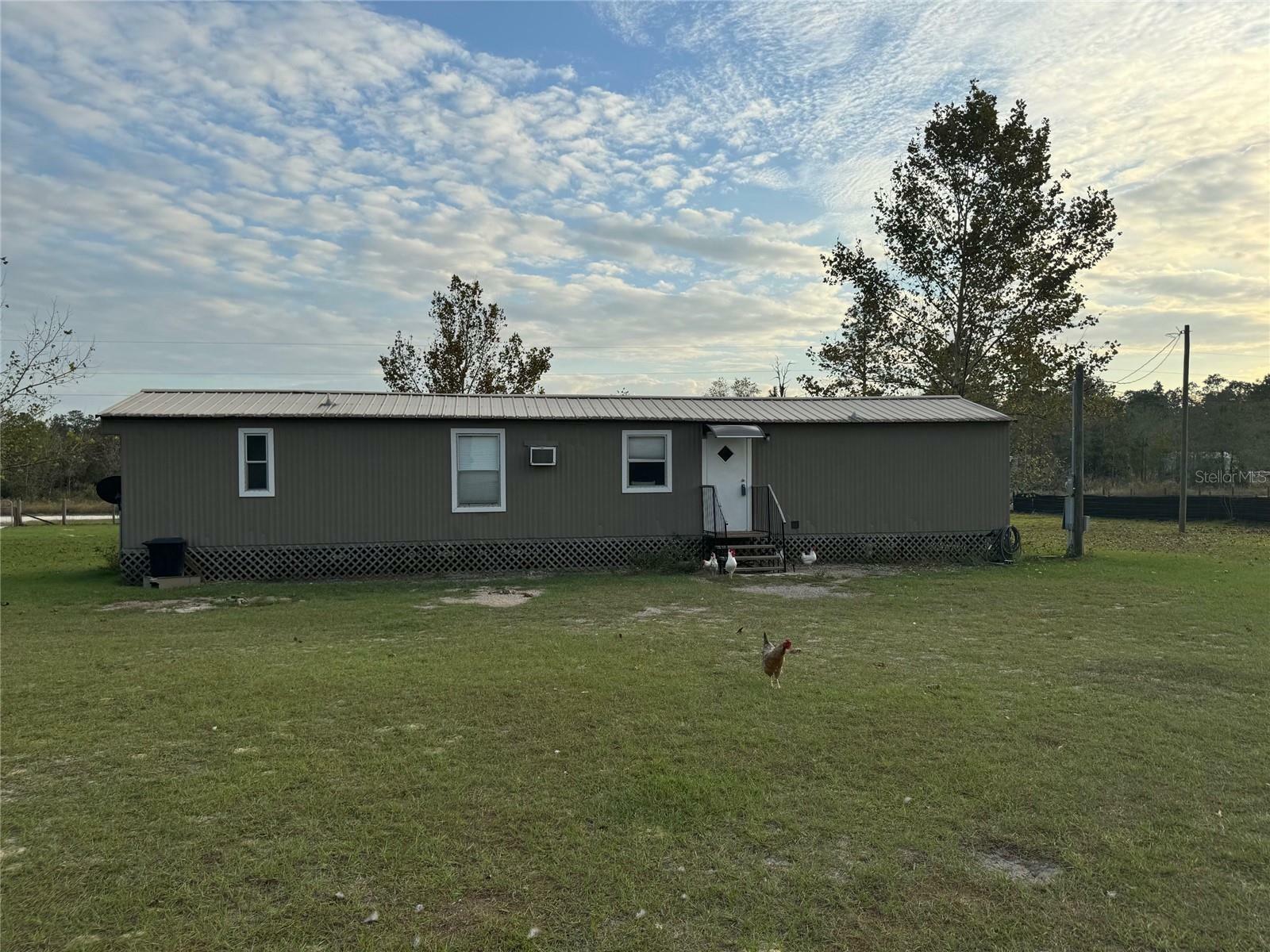 Property Photo:  12571 NE 14th Street  FL 32696 