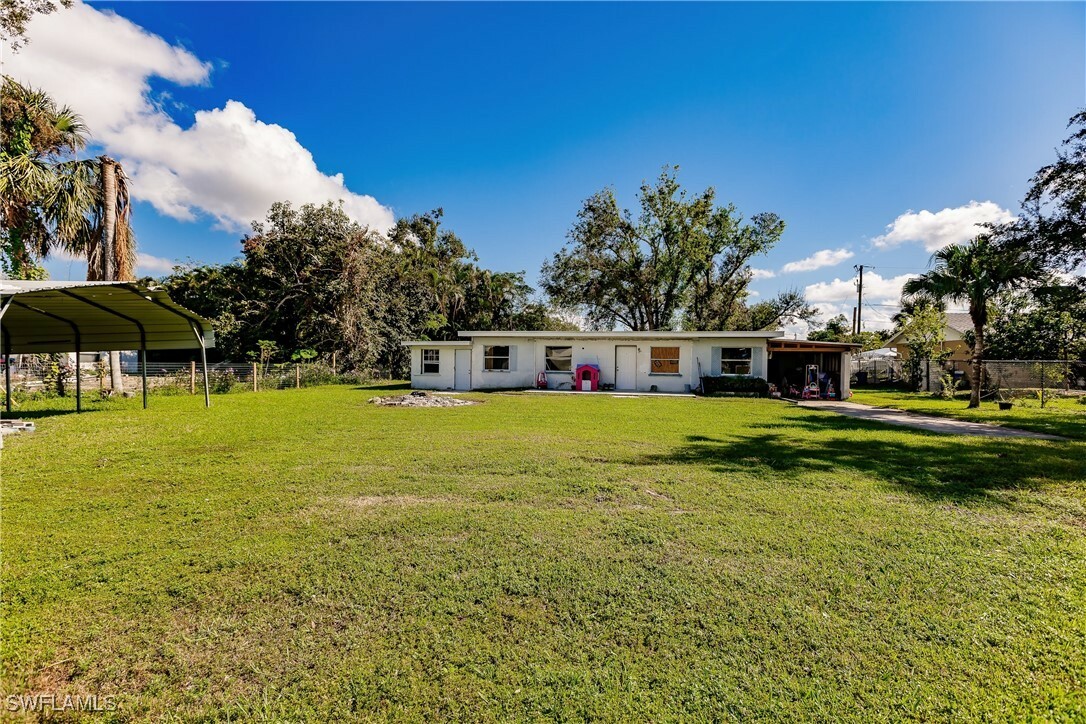 Property Photo:  716 Pondella Road  FL 33903 