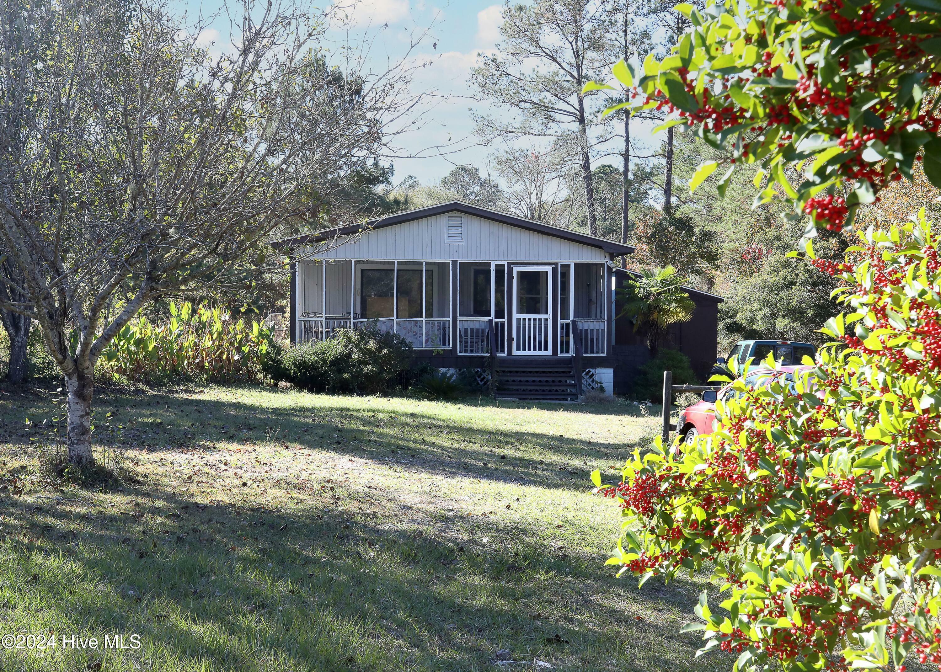 Property Photo: 408 Old Folkstone Road NC 28445