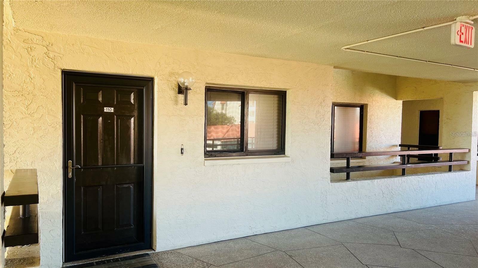 Property Photo:  106 1st Street E 110  FL 33715 