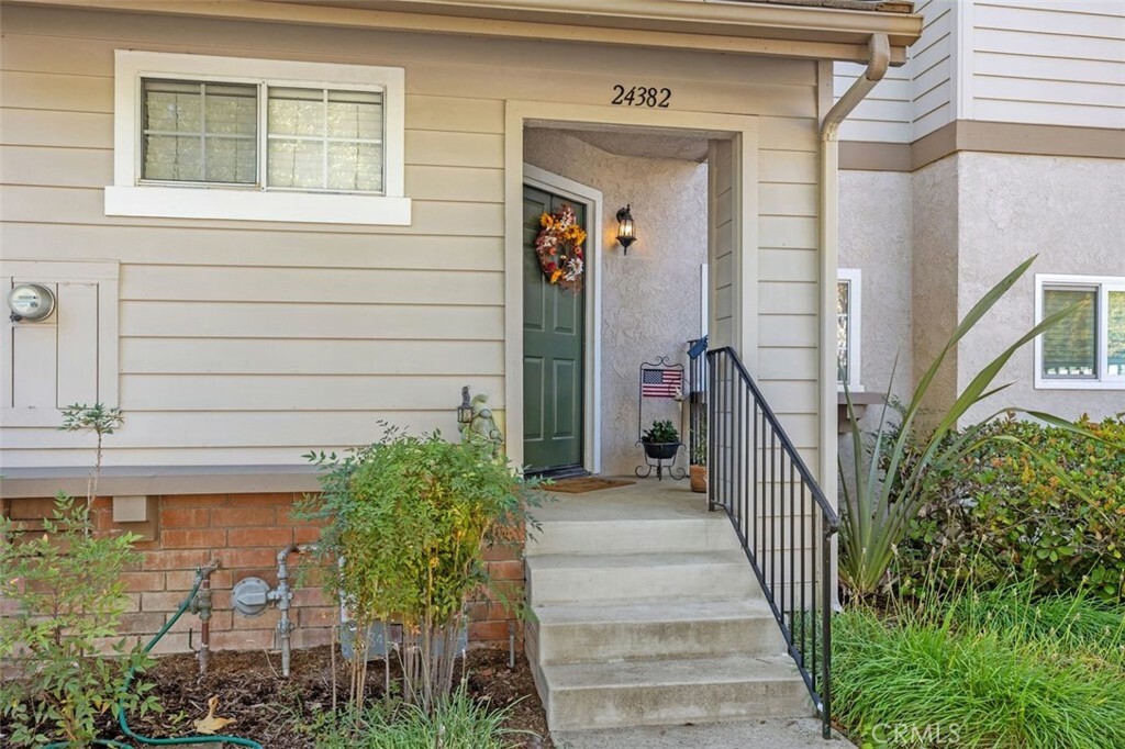 Property Photo:  24382 Larchmont Court 66  CA 92653 