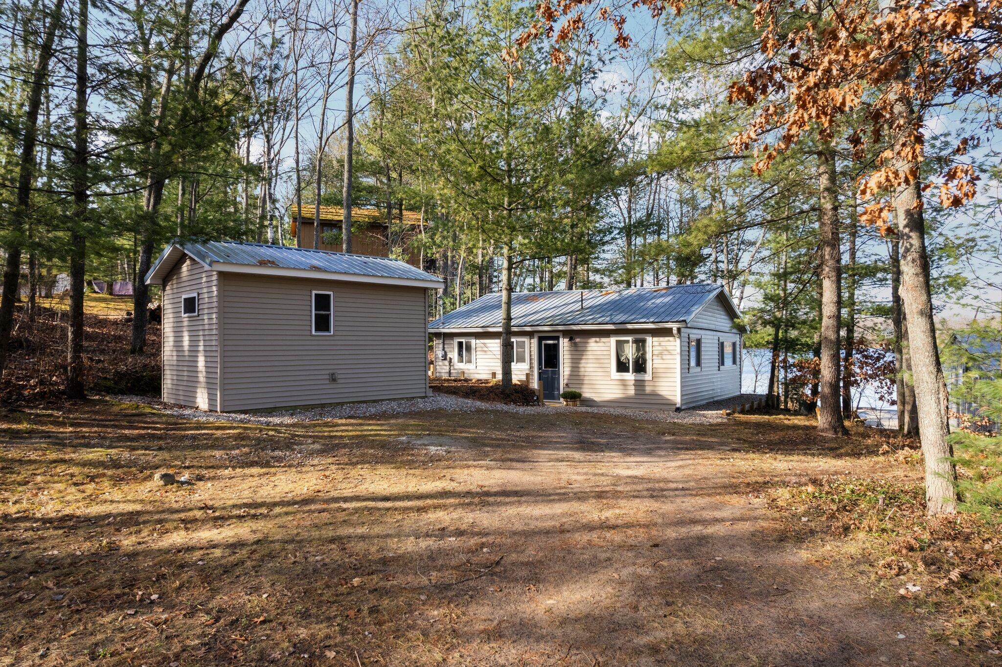 Property Photo:  6832 Beach Road  MI 49751 