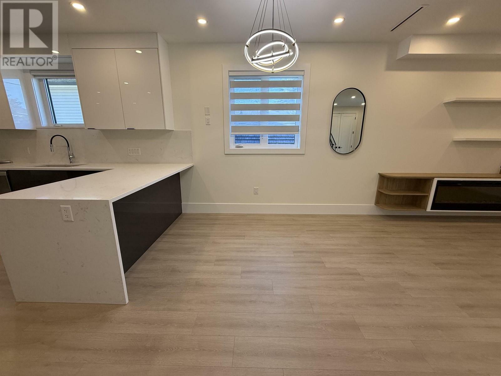 Property Photo:  4212 Macdonald Avenue 2  BC V5M 2K2 