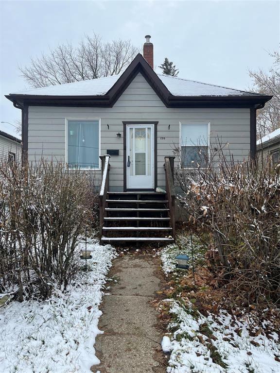 Property Photo:  136 Rosser Avenue East  MB R7A 1P3 