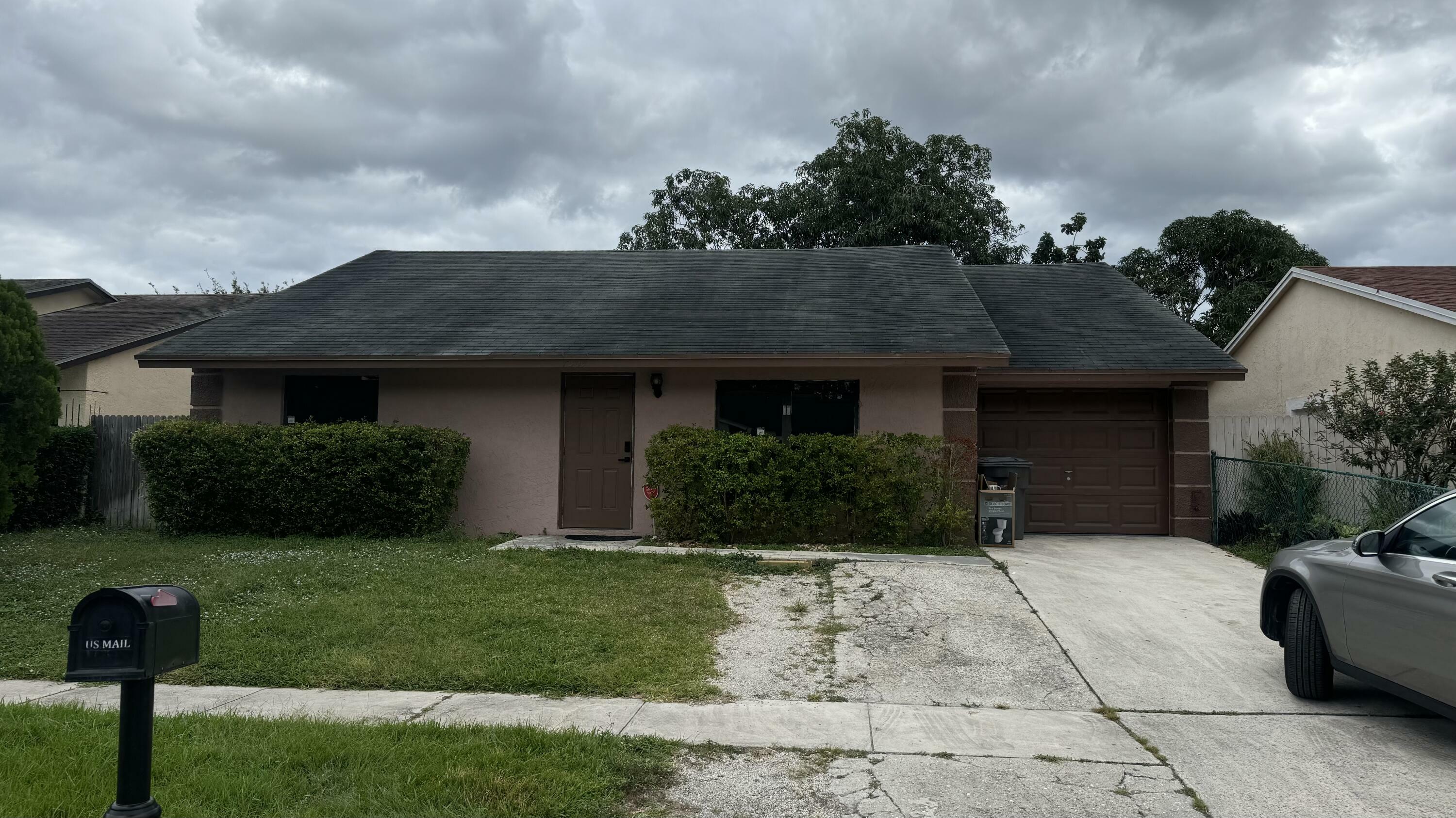 Property Photo:  7309 Willow Spring W  FL 33436 