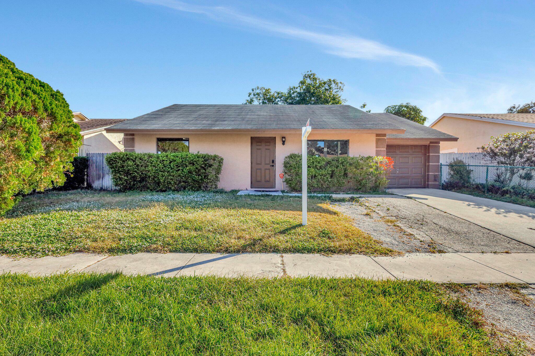 Property Photo:  7309 Willow Spring W  FL 33436 