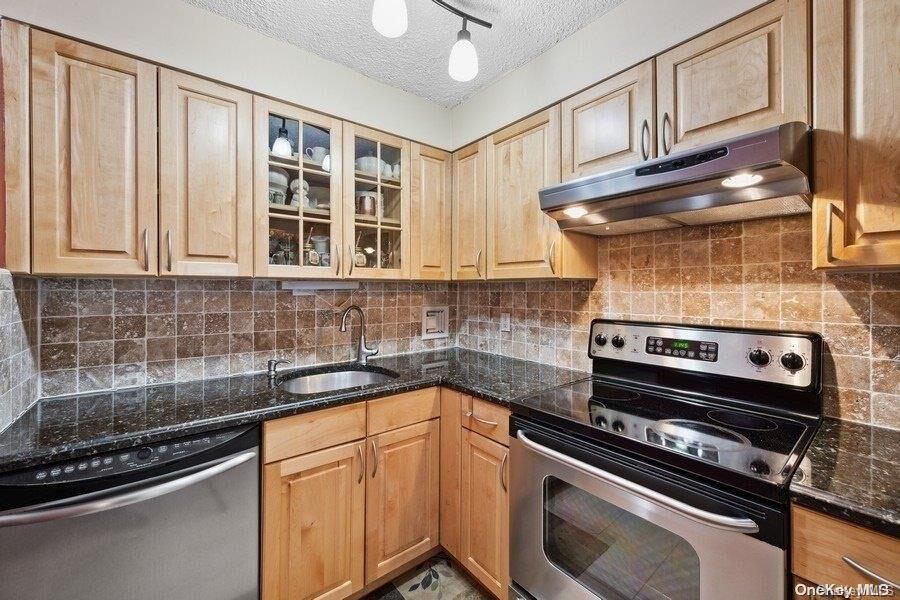 Property Photo: 9-05 166th Street 4D NY 11357