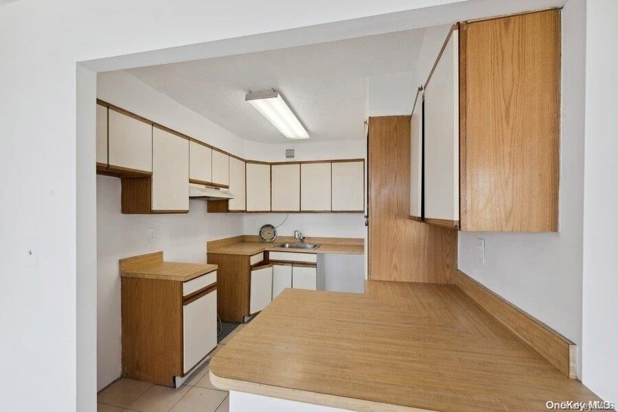 Property Photo: 10-34 166th Street 8C NY 11357