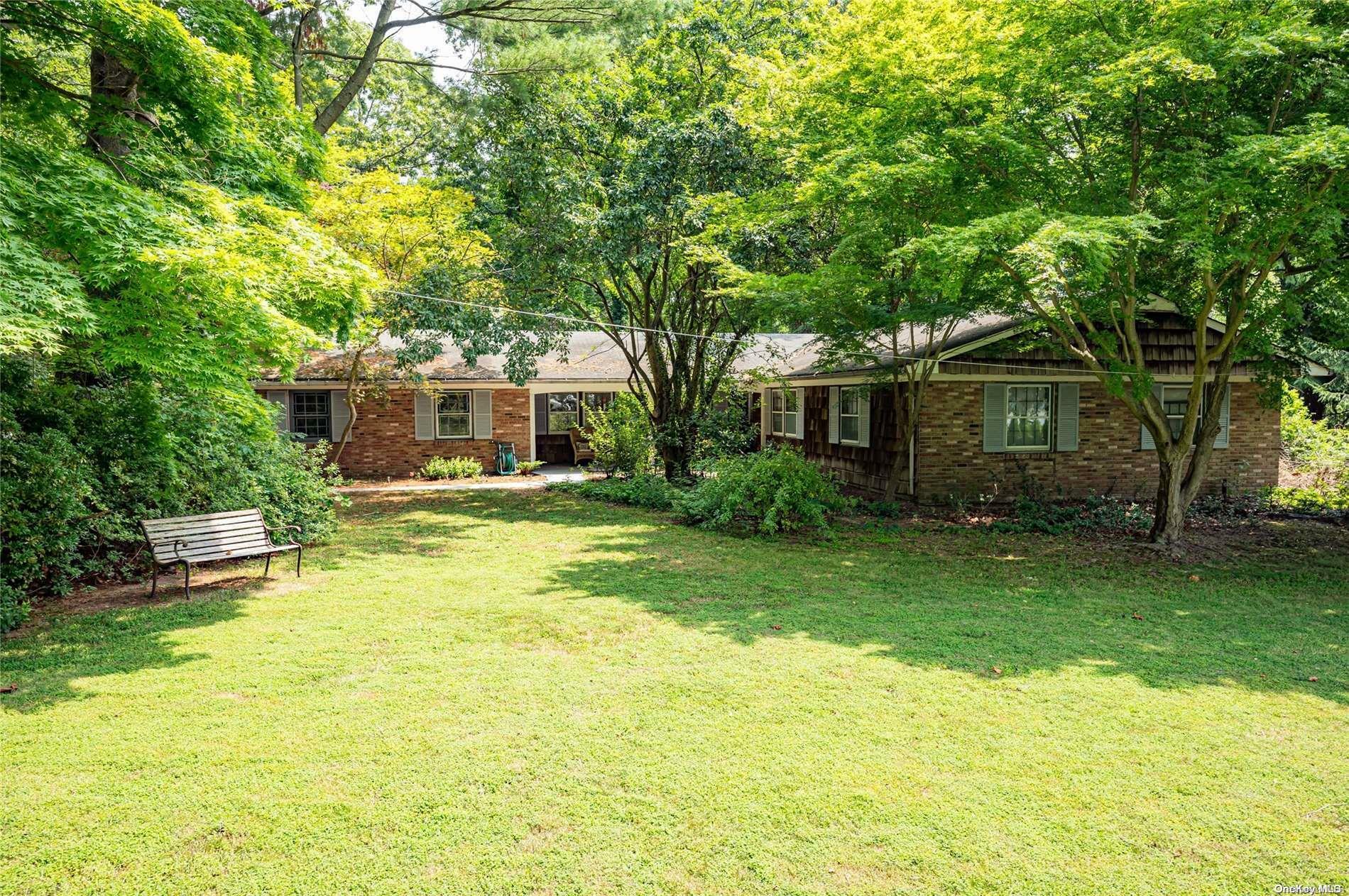 Property Photo: 4 Woods End Road S NY 11746