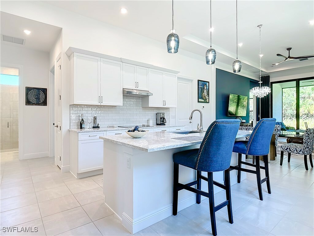Property Photo: 108 SE Strada Cervaro FL 34952