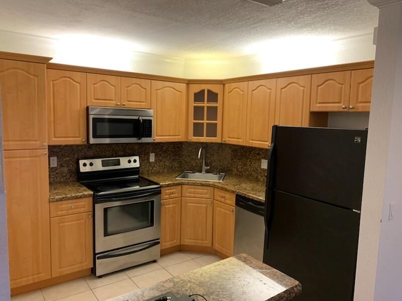Property Photo:  3857 Coral Tree Circle 304  FL 33073 