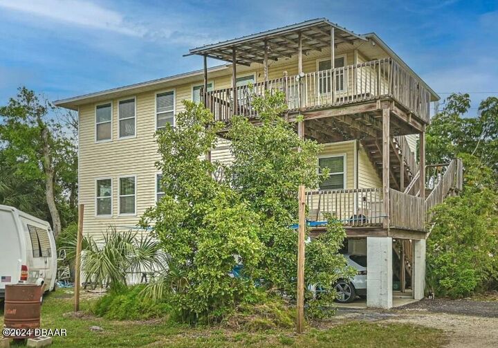 Property Photo:  830 S Peninsula Drive  FL 32118 