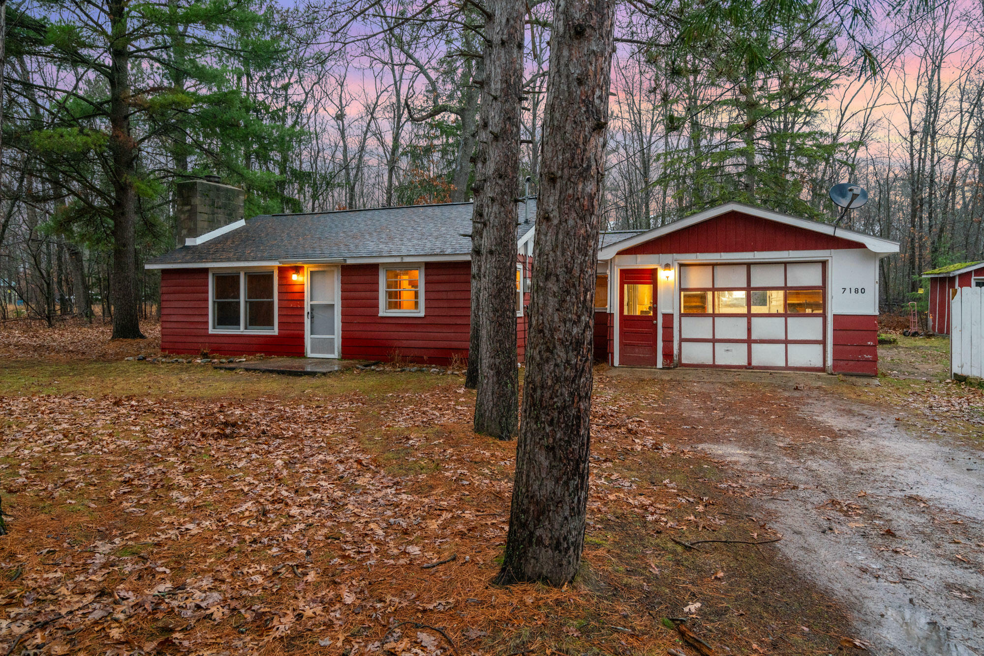 Property Photo:  7180 Fisher Woods Road  MI 49749 