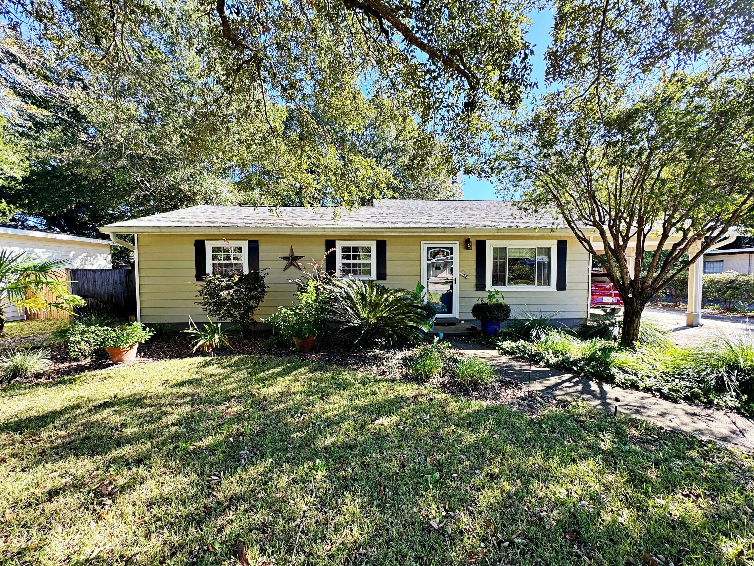 Property Photo:  113 NW Rainbow Drive  FL 32548 