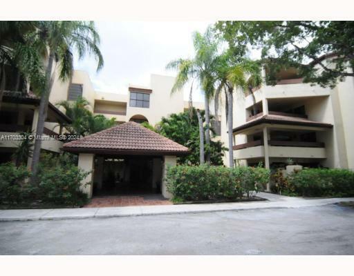 Property Photo:  8800 SW 123 Ct J204  FL 33186 