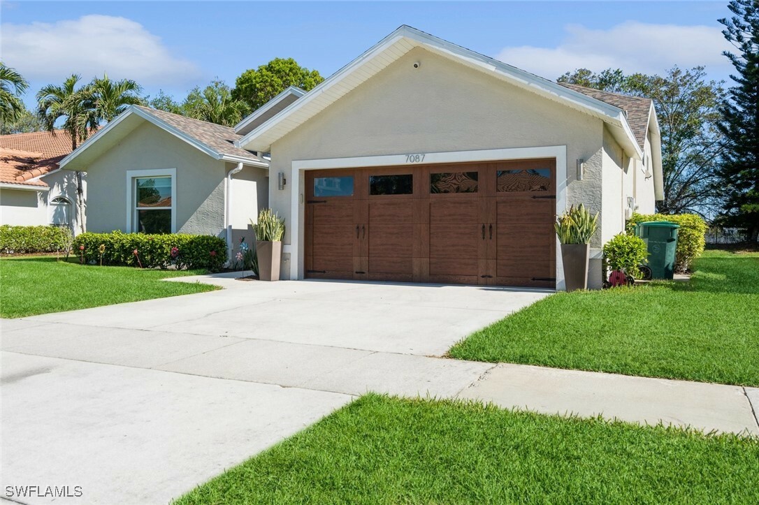 Property Photo:  7087 Lone Oak Boulevard  FL 34109 