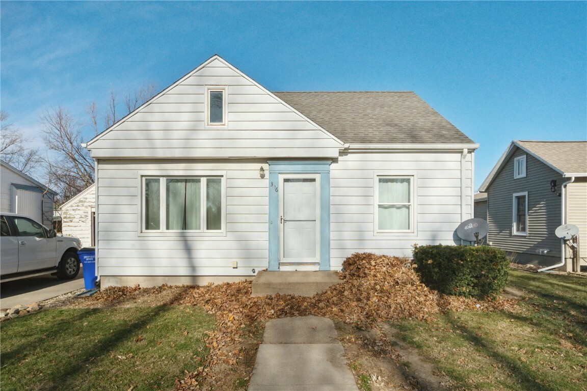 Property Photo:  306 E 1st Avenue  IA 52253 