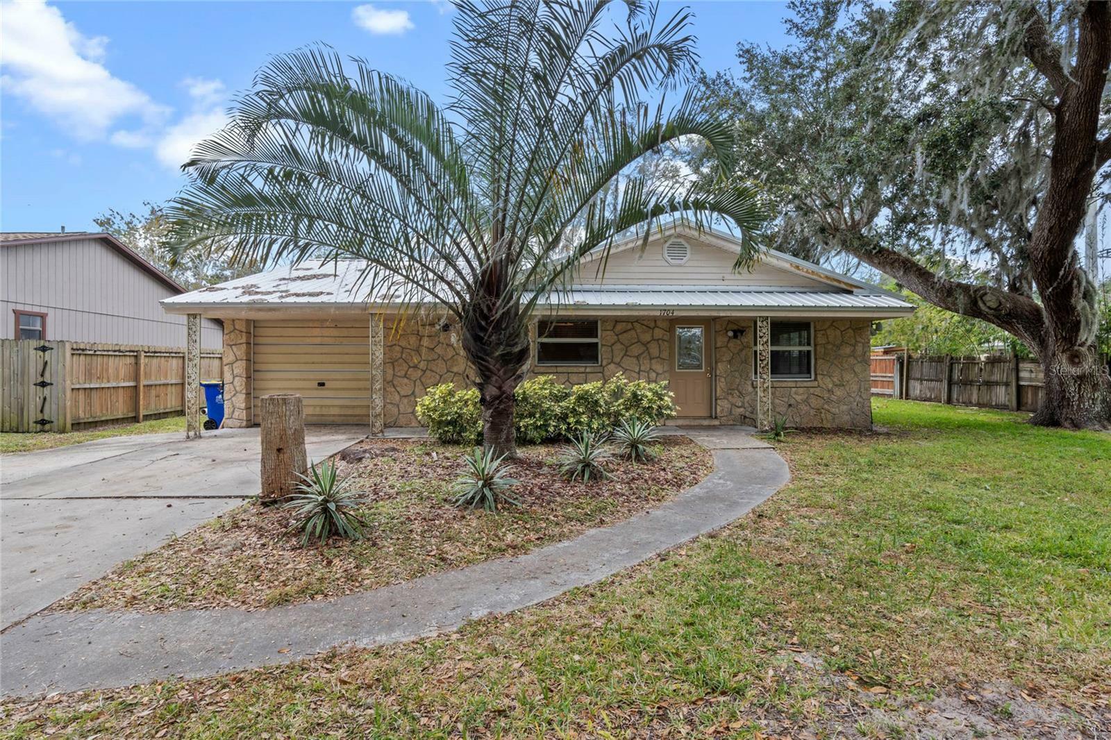 Property Photo:  1704 Travelers Palm Drive  FL 32132 