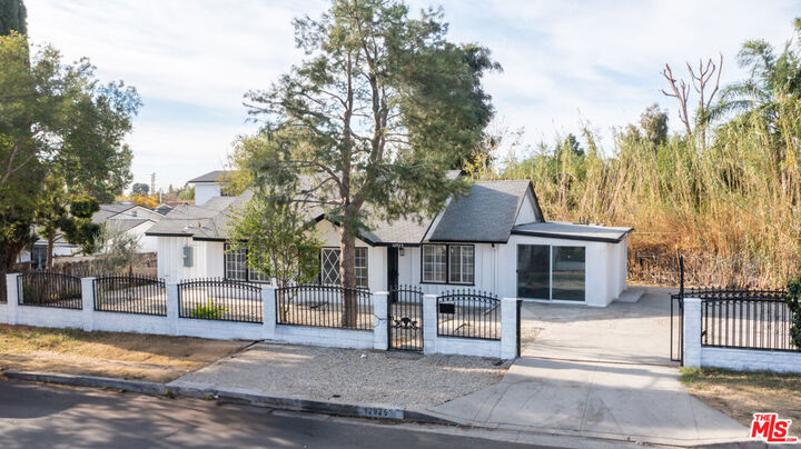 Property Photo:  12925 Norris Avenue  CA 91342 