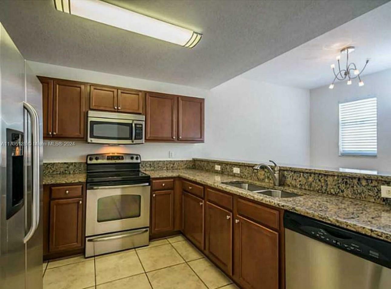 Property Photo:  11401 NW 89th St 213  FL 33178 