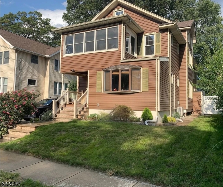 Property Photo:  205 9th Ave 1  NJ 07506 