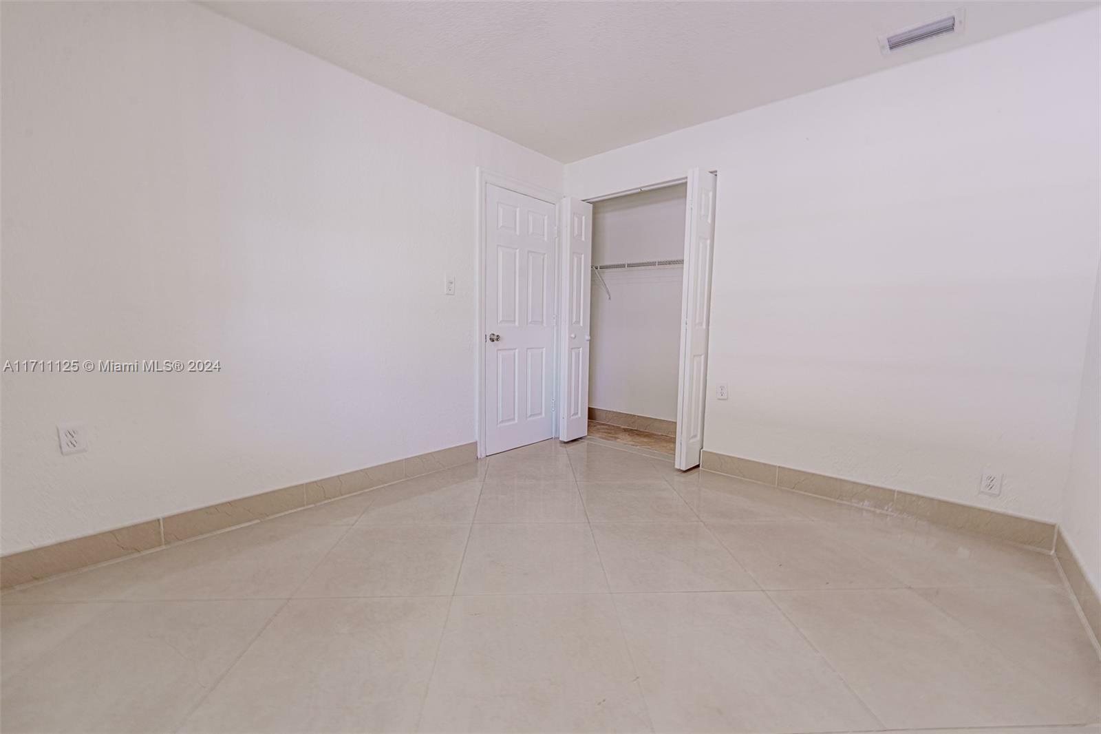 Property Photo:  2801 NW 103rd St 1  FL 33147 