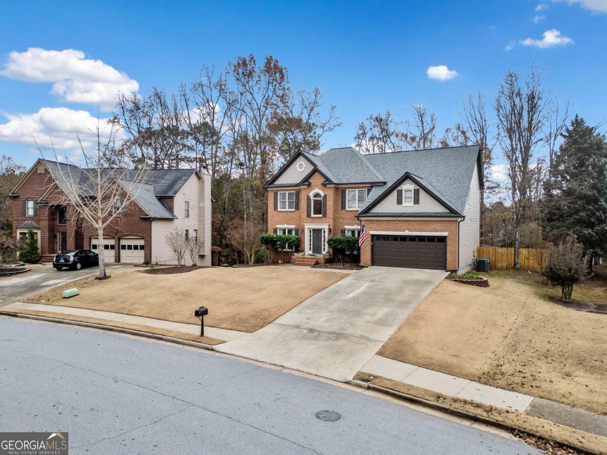 Property Photo:  8415 River Walk Landing  GA 30024 